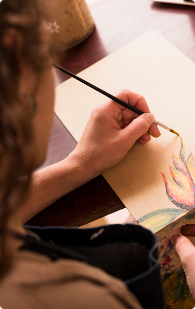 Student drawing artwork